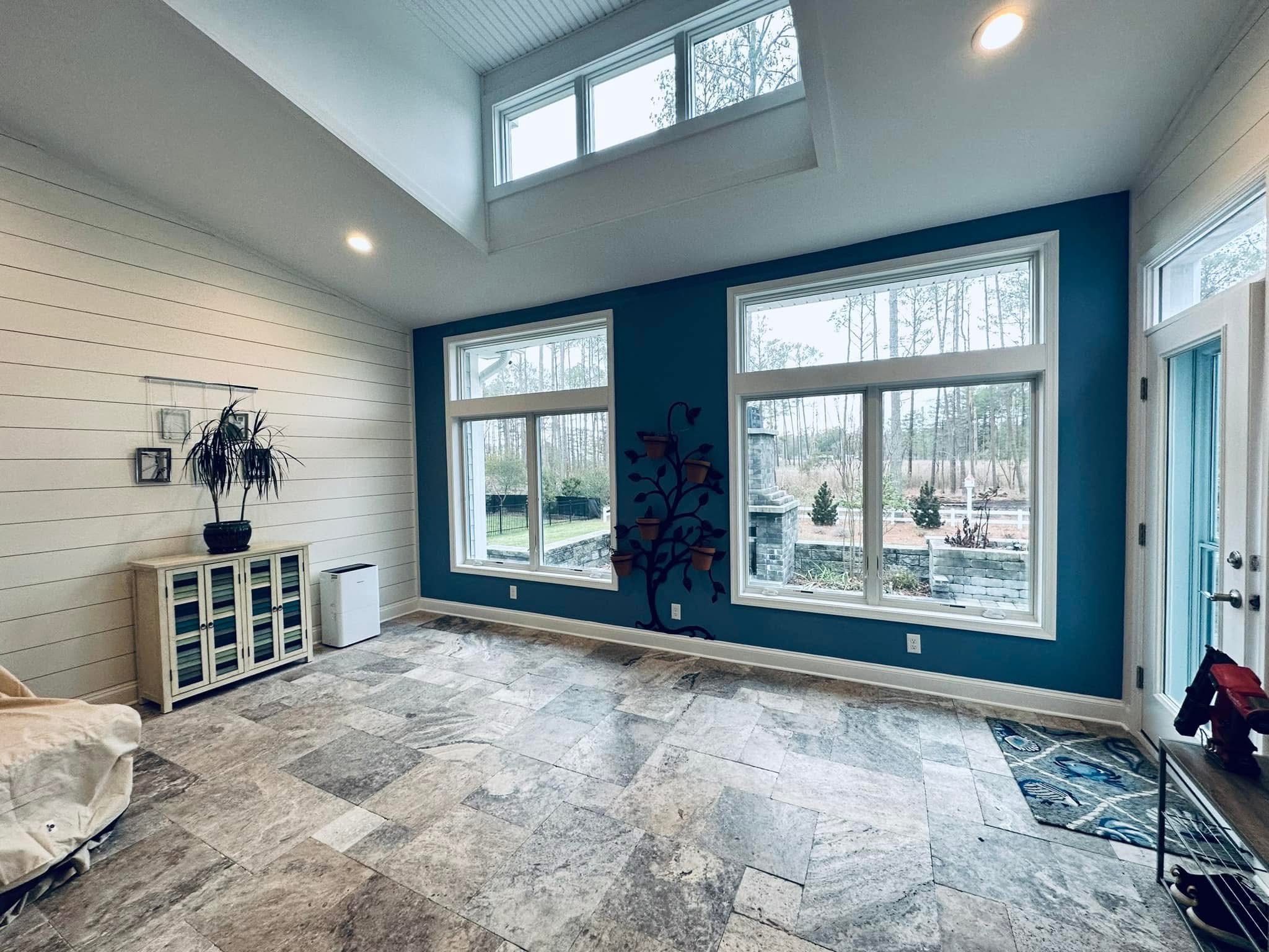 Teal accent wall in sunroom, Rehoboth Beach DE