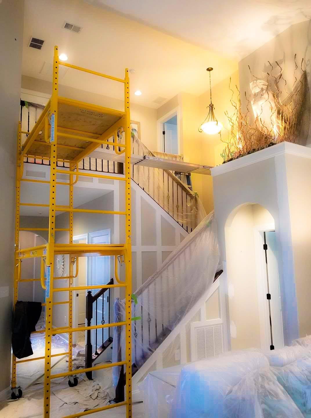Interior painting — high-ceiling stairwell — Bridgeville area