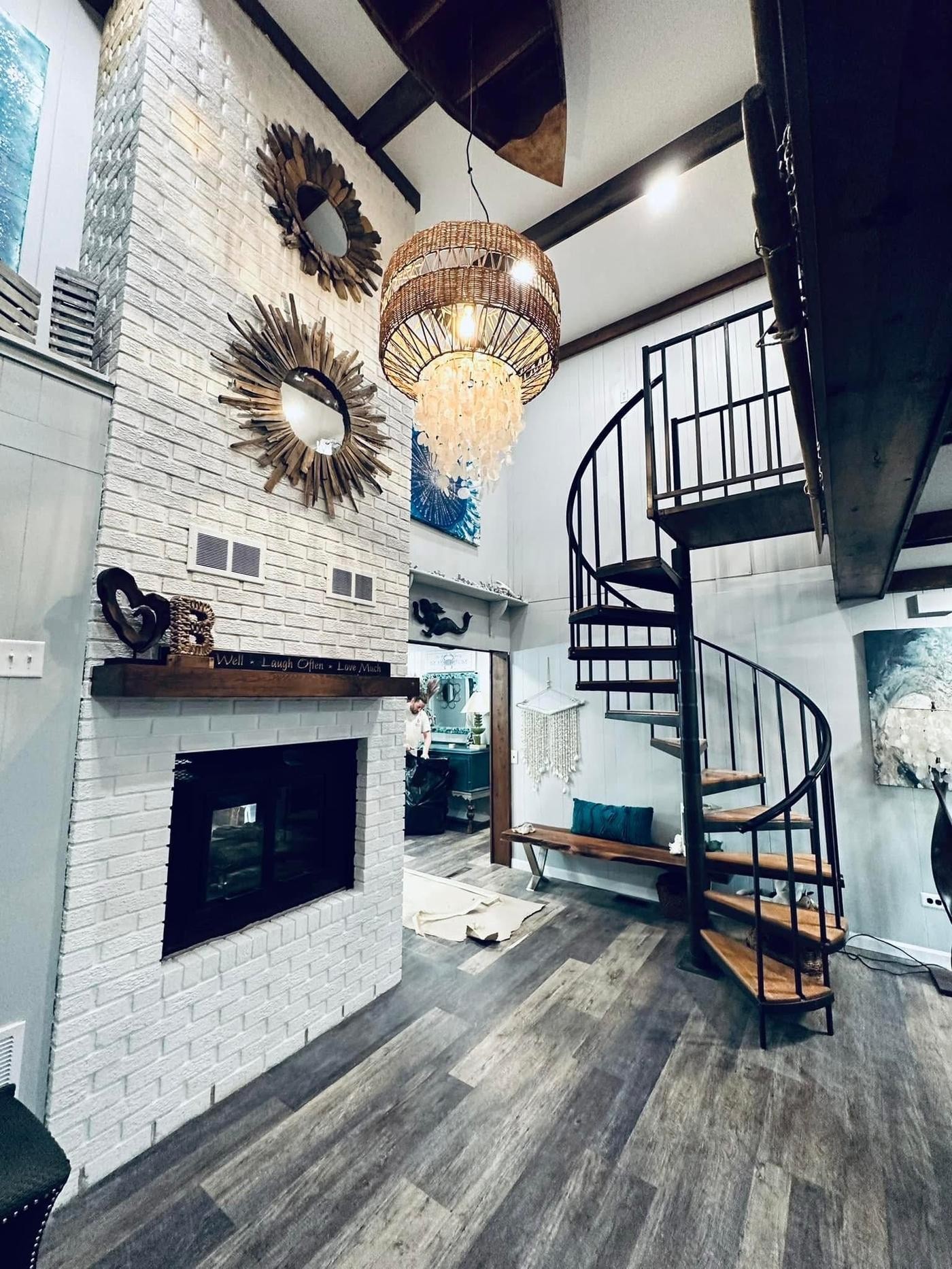 Interior repair — whitewashed brick, spiral staircase — Broadkill Beach area