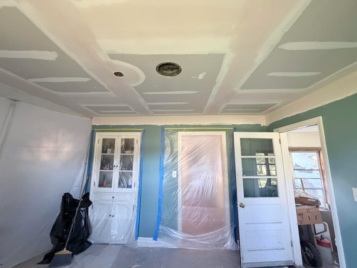 Storm damage repair — new drywall and insulation — Long Neck area