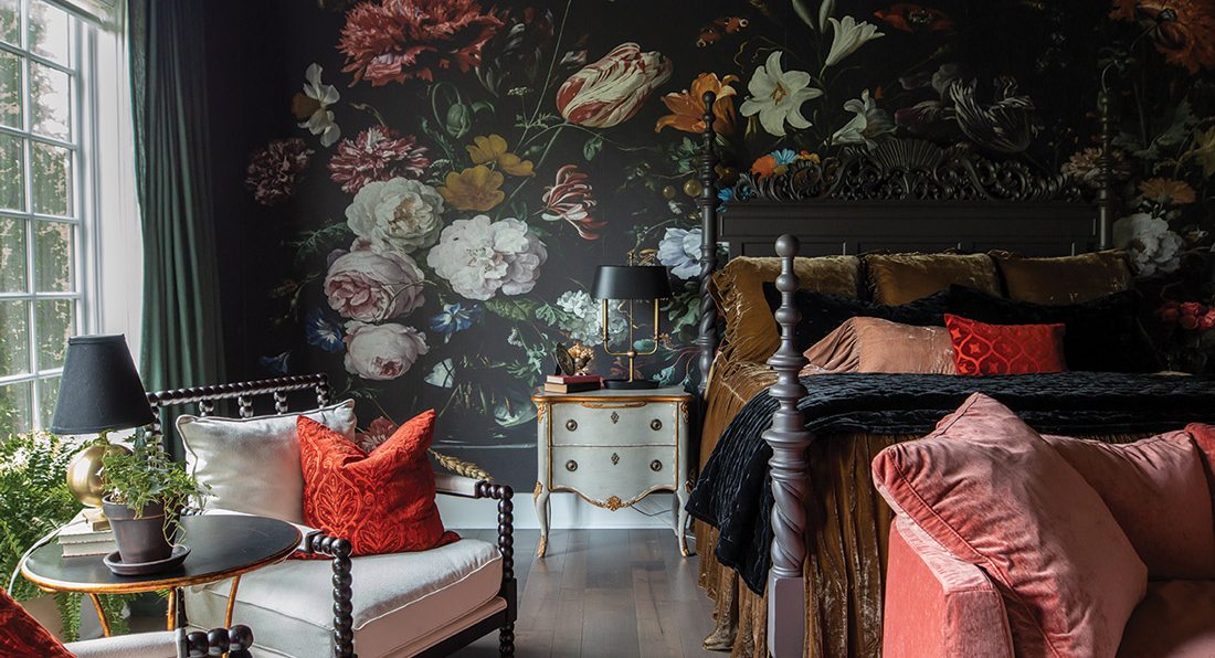 Dark moody bedroom with deep navy walls