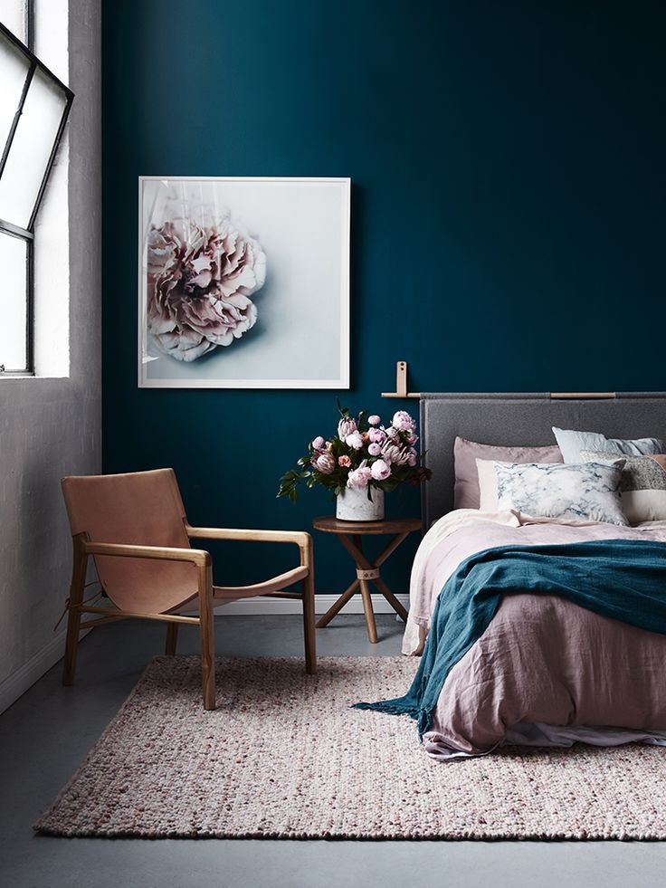 Teal accent wall in bedroom