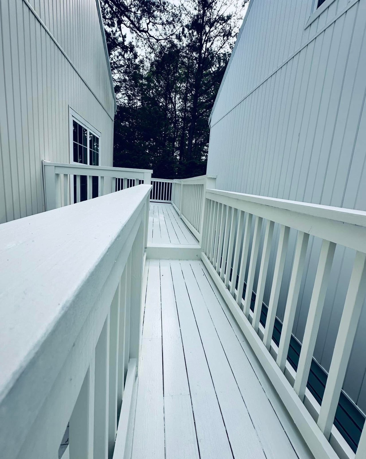 Bethany Beach deck railings and spindles being coated