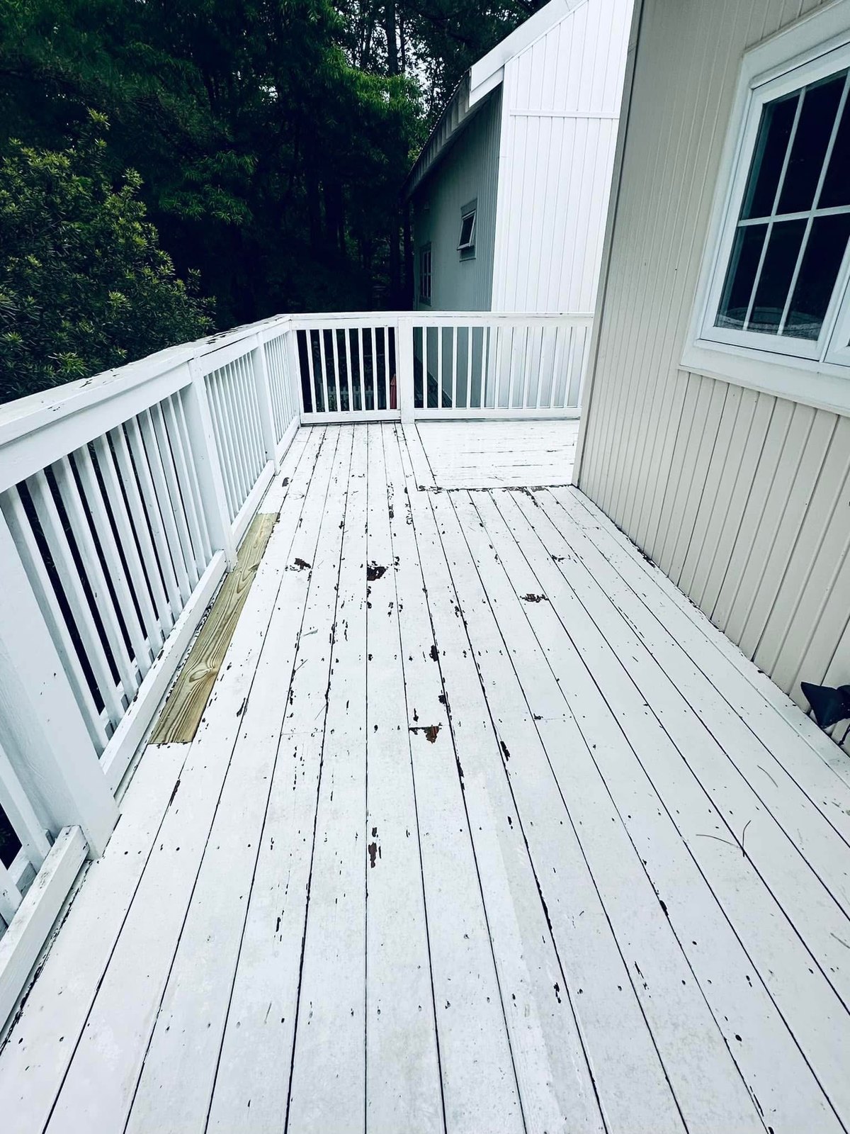 Bethany Beach solid stain application on deck boards