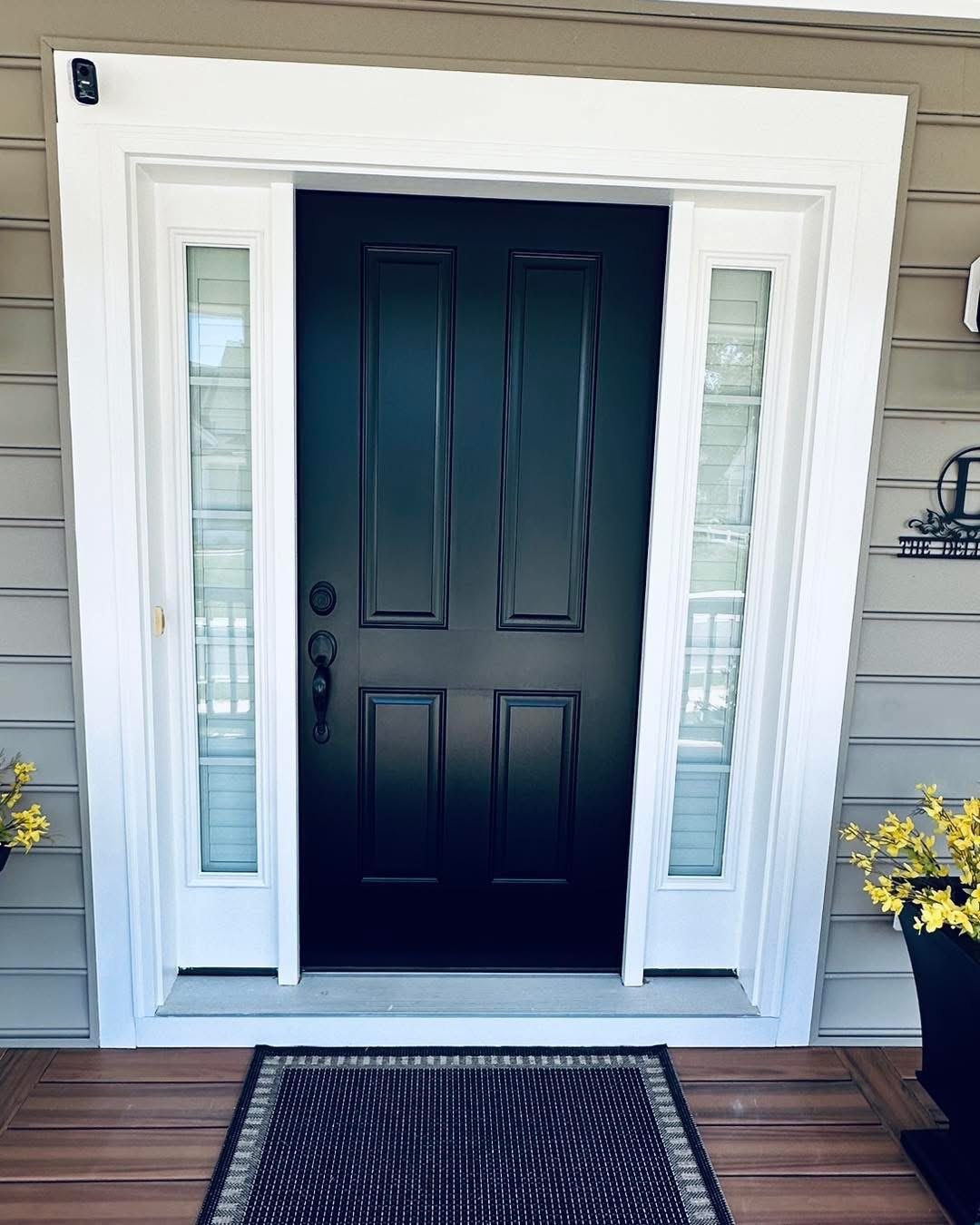 Baywood Greens Tricorn Black front door and white surround