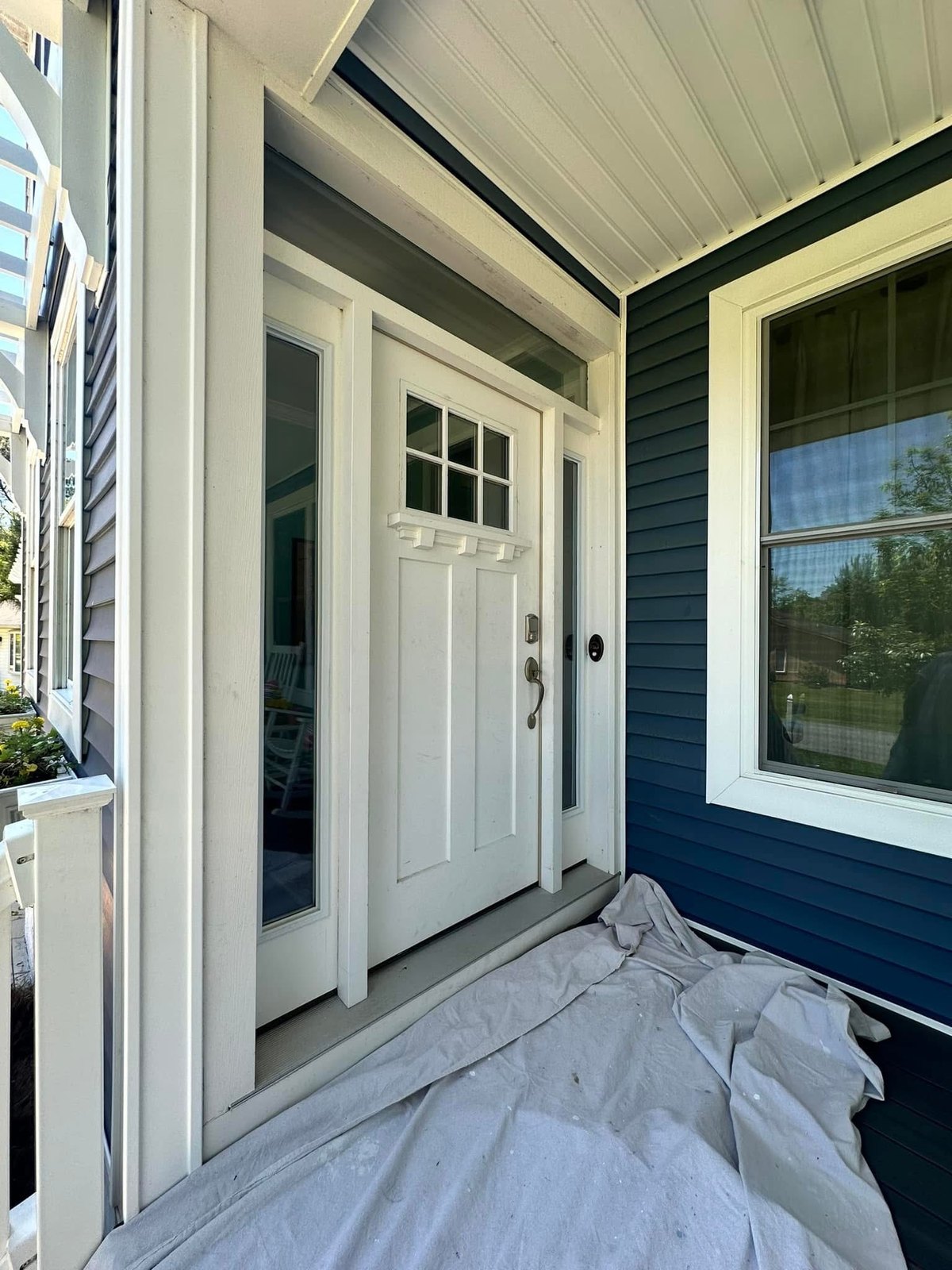 Bethany Beach entry door protected before Coral Odyssey finish