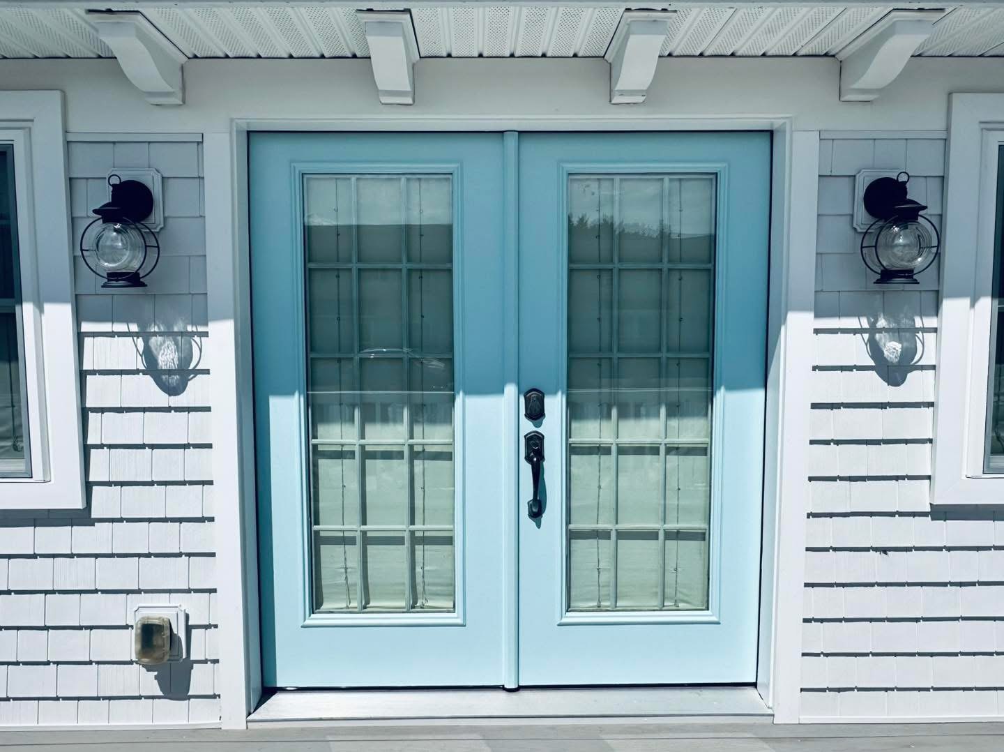 Coastal door and casing repaint project photo 1