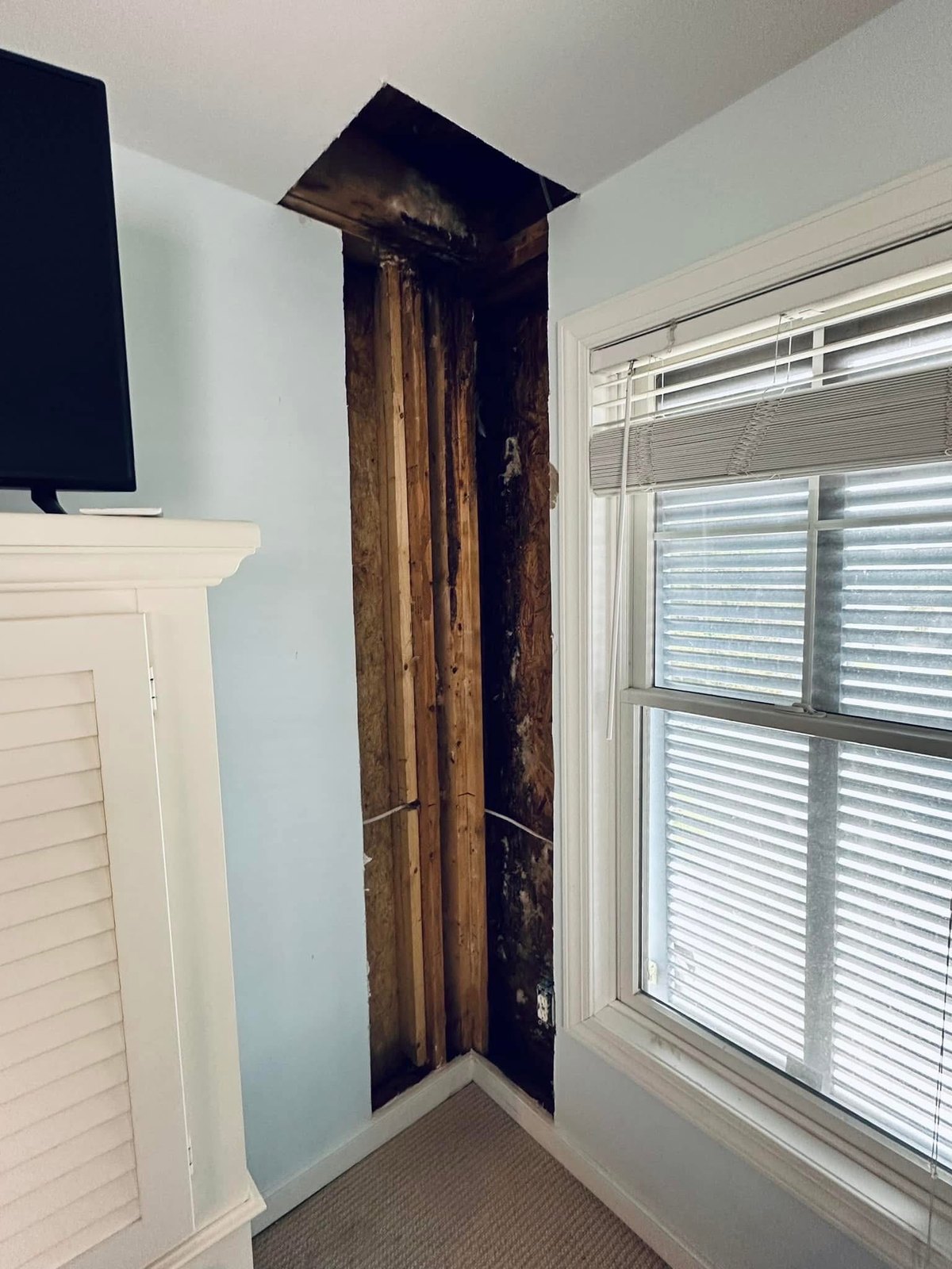 Dewey Beach opened wall and ceiling area after water damage