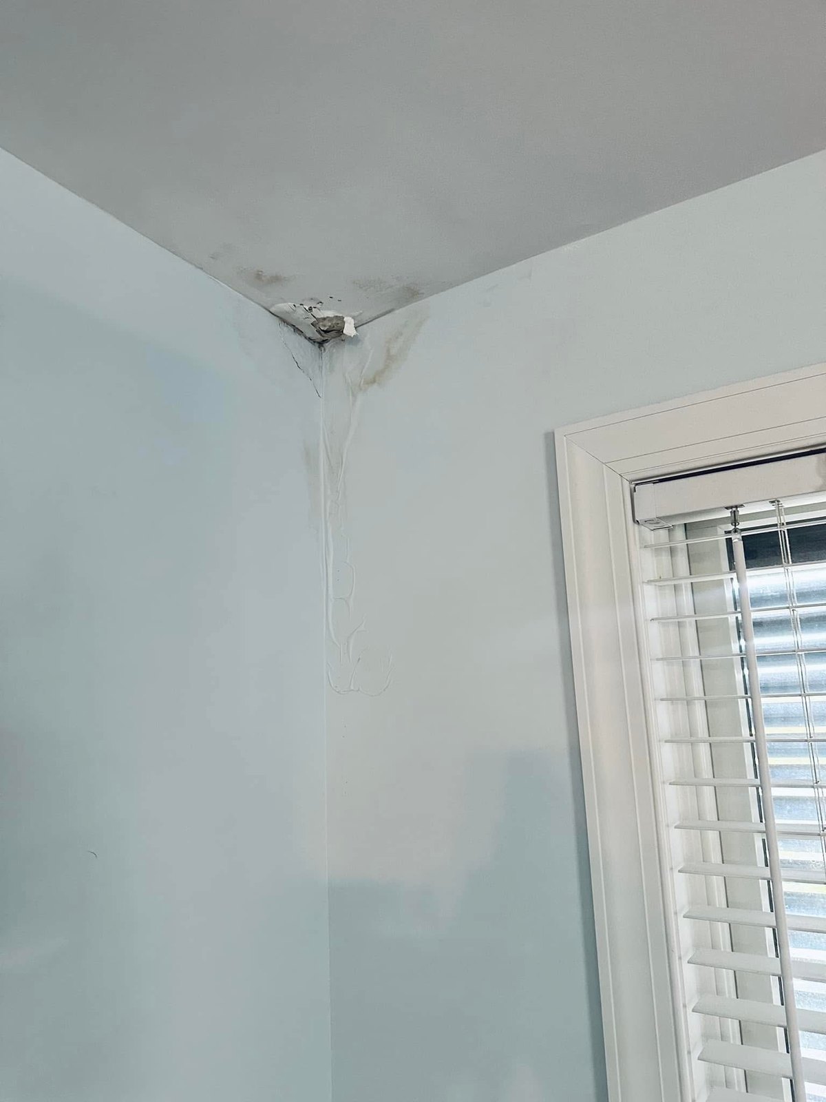 Dewey Beach ceiling corner opening after water damage