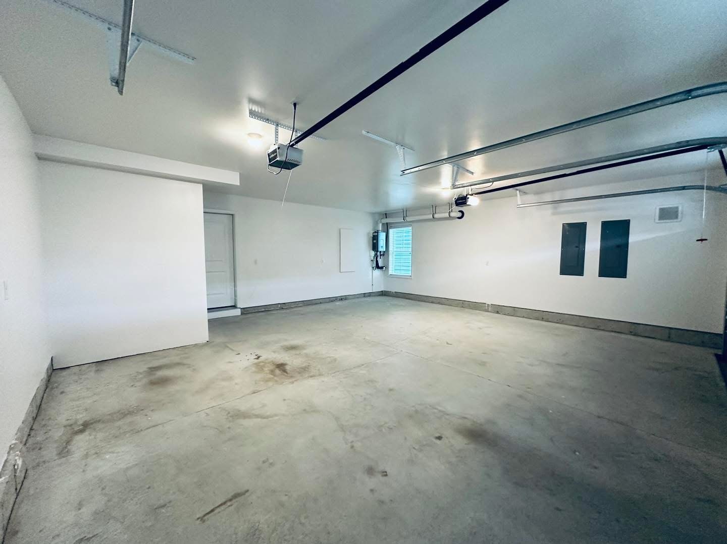 Residential garage completed view with door open