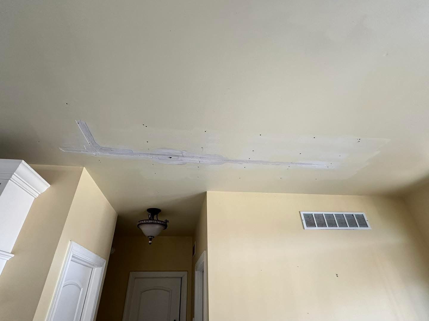 Greenwood damaged ceiling seam after roof leak