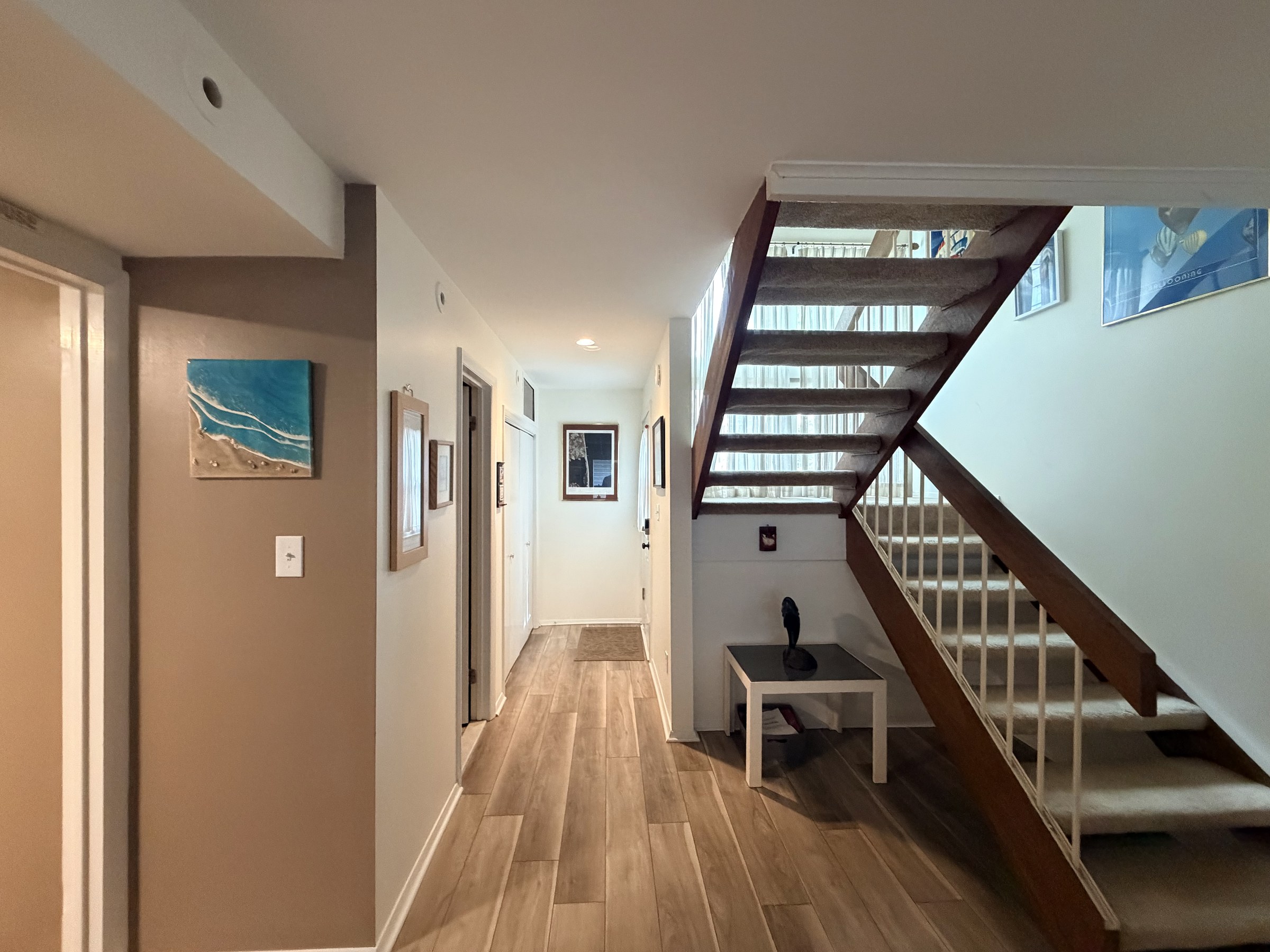 Finished Lake Comegys hallway and stair area after interior painting