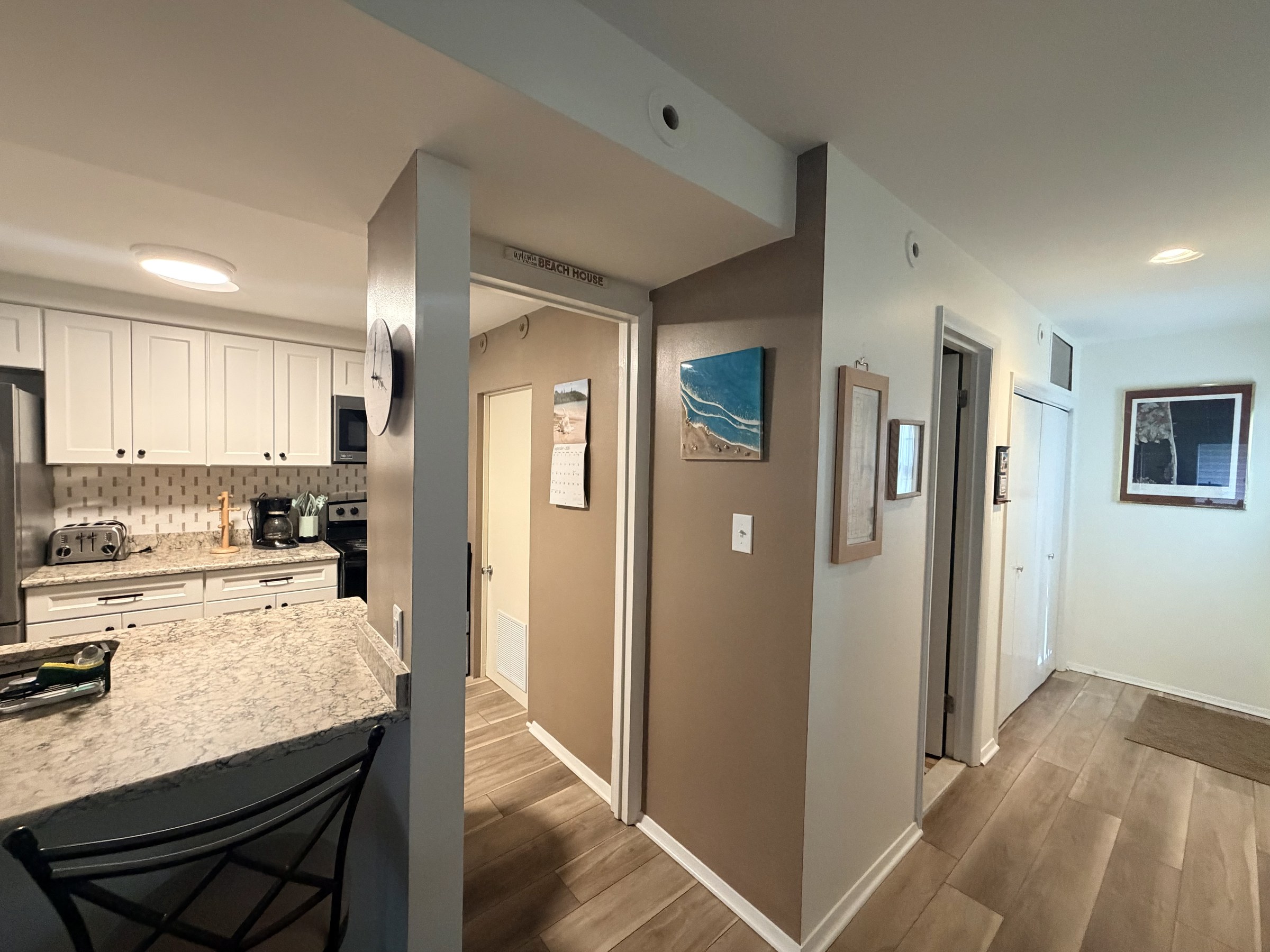 Finished Lake Comegys kitchen and hallway interior view