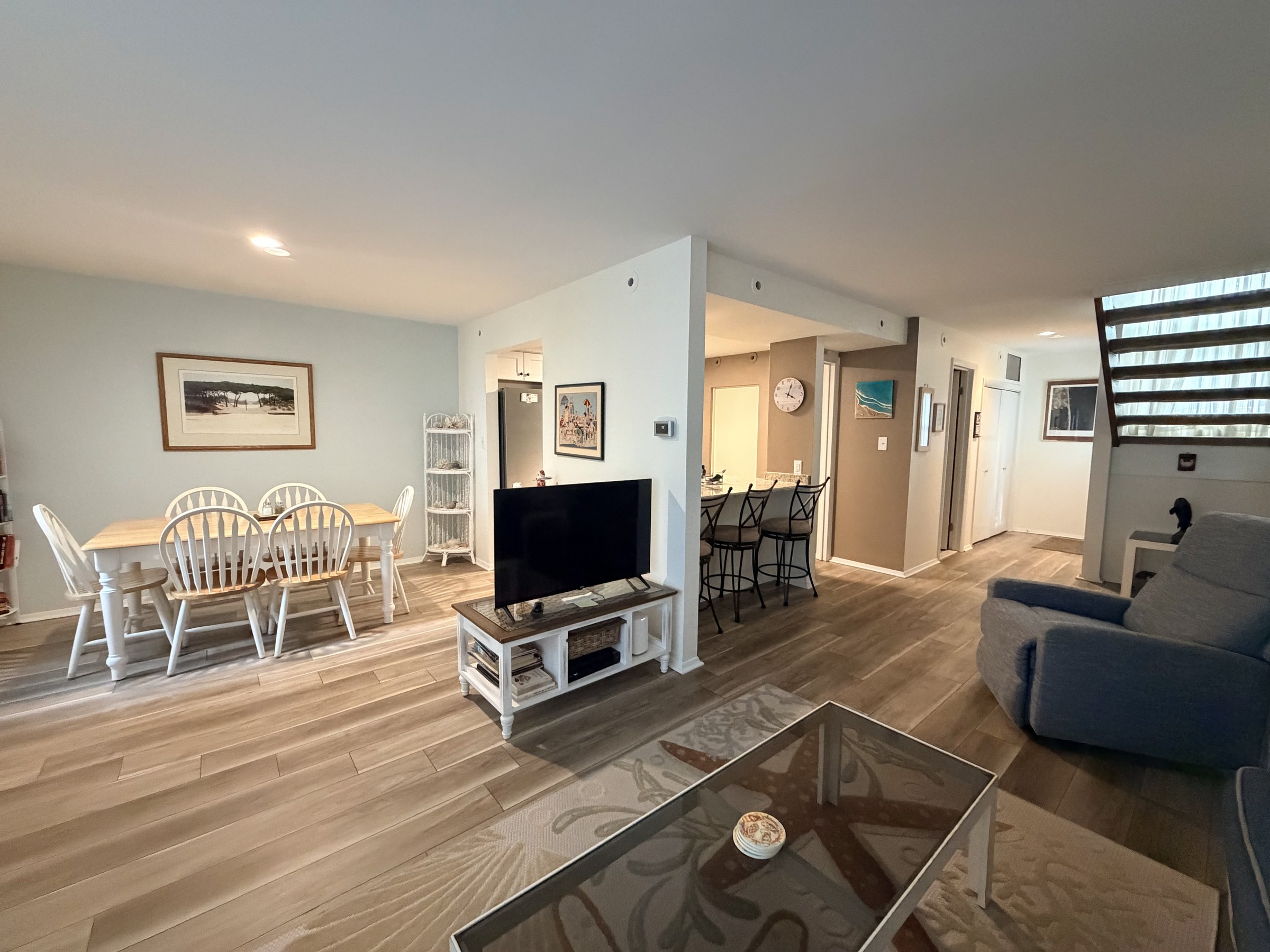 Finished Lake Comegys open kitchen, living, and stair area view
