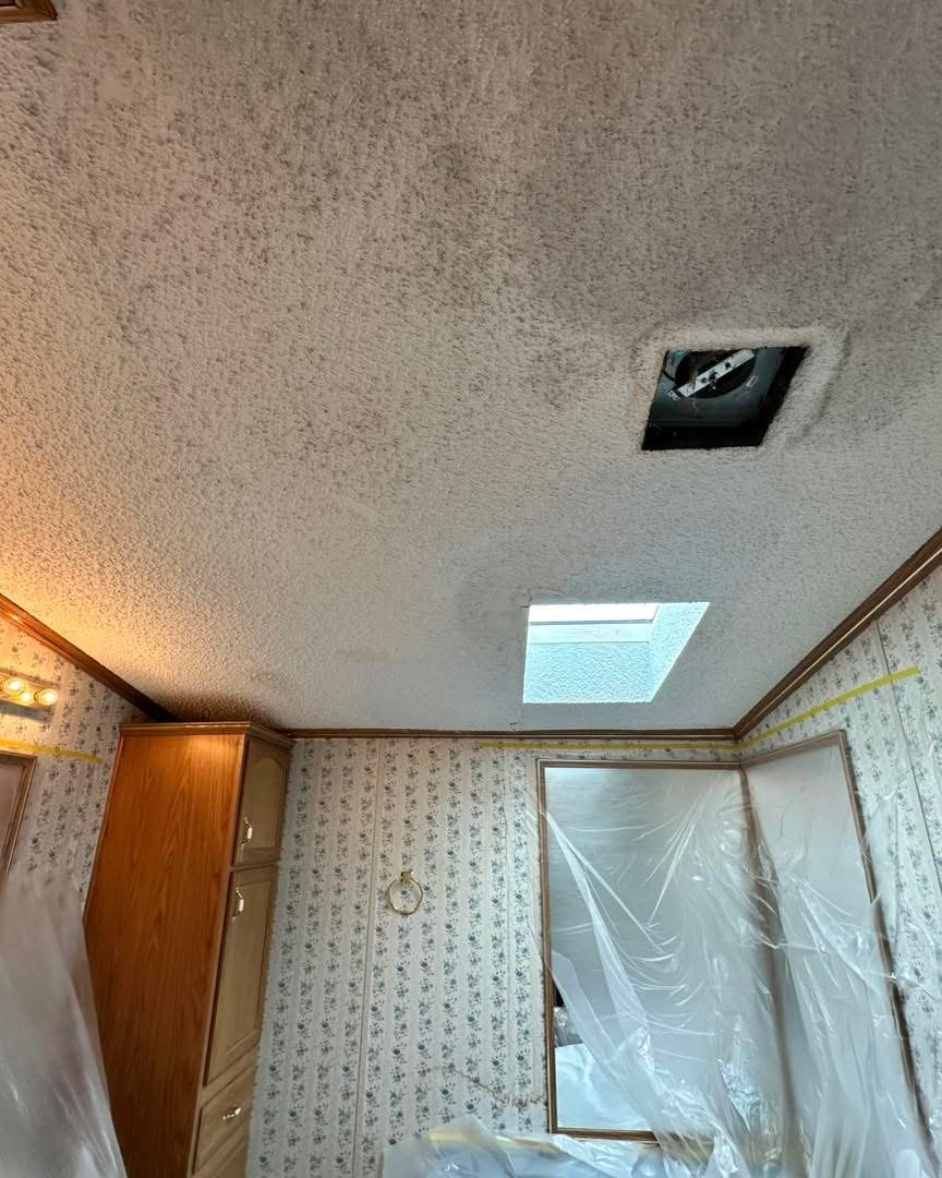 Laurel water-damage and popcorn ceiling restoration project photo 2