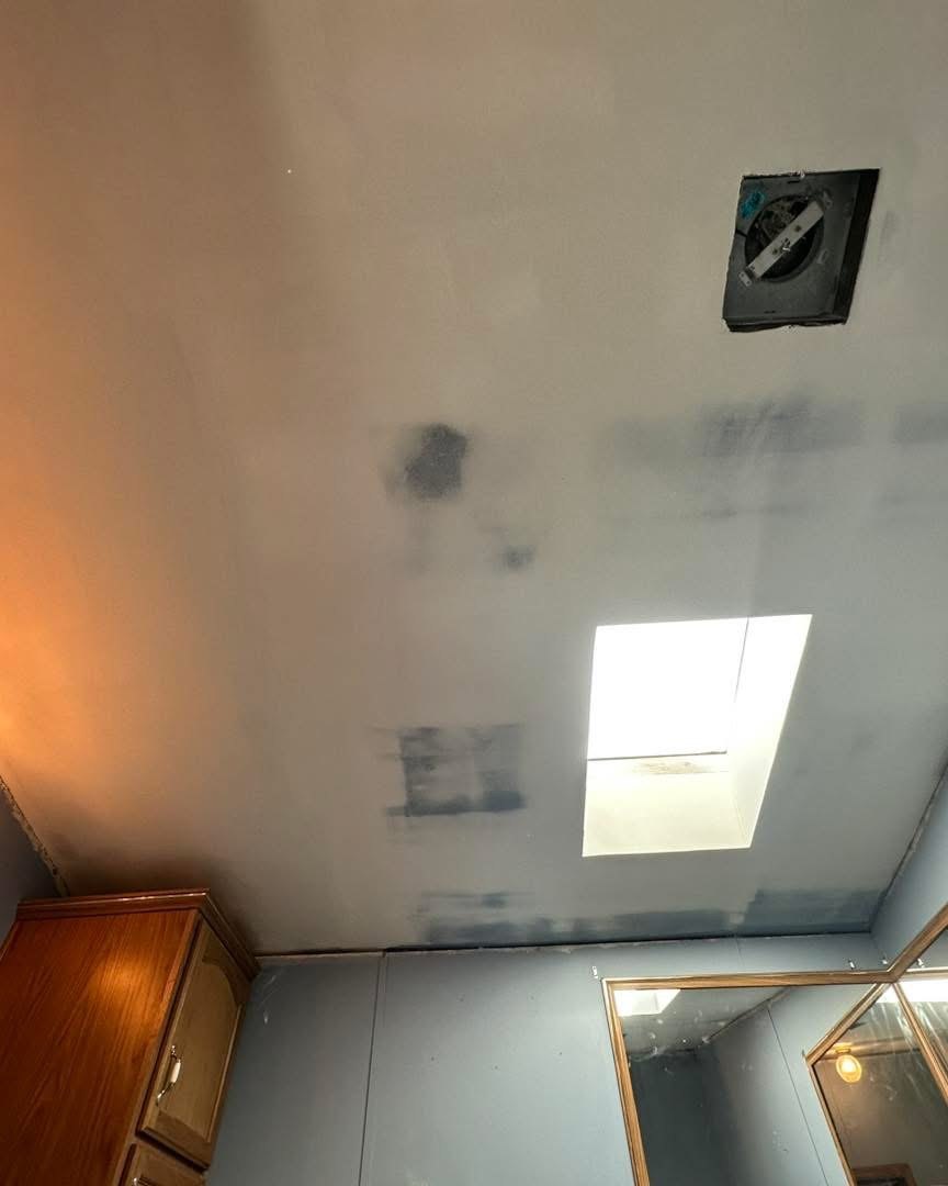 Laurel water-damage and popcorn ceiling restoration project photo 4