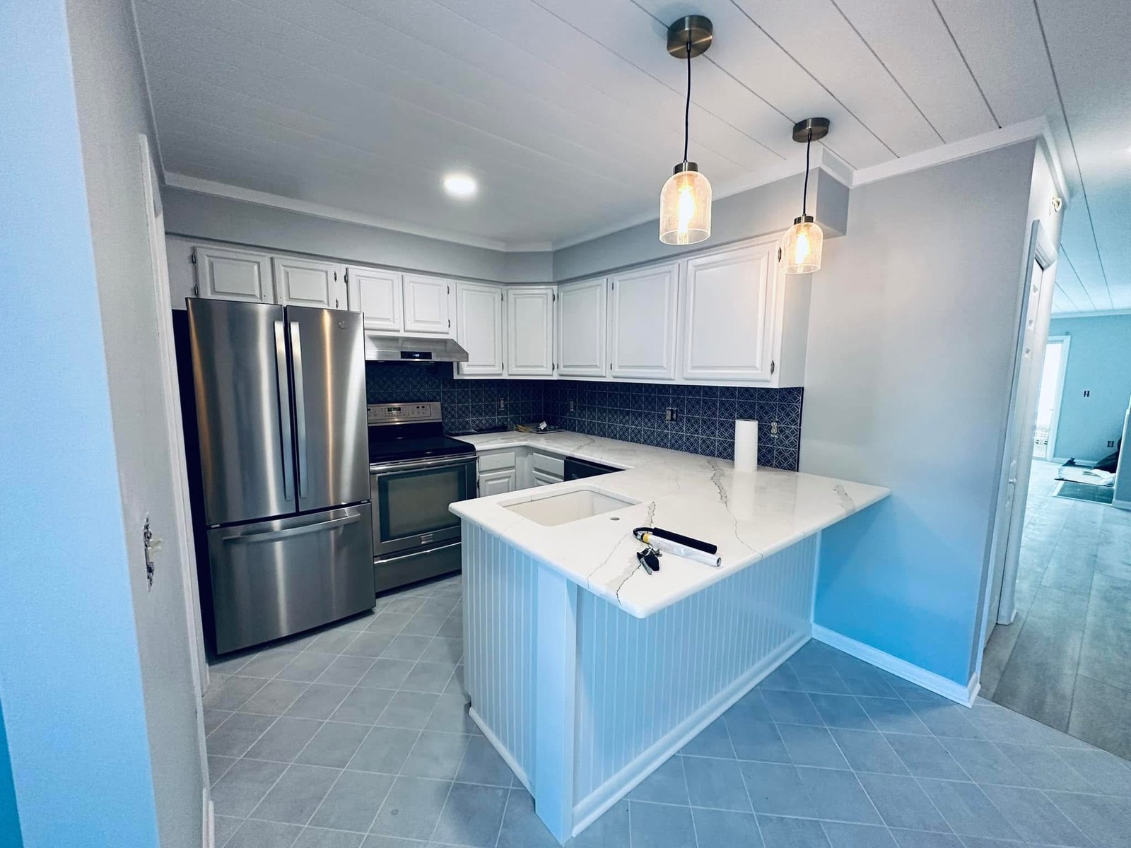 Mallard Lakes, Fenwick Island kitchen cabinets after Satin White finish