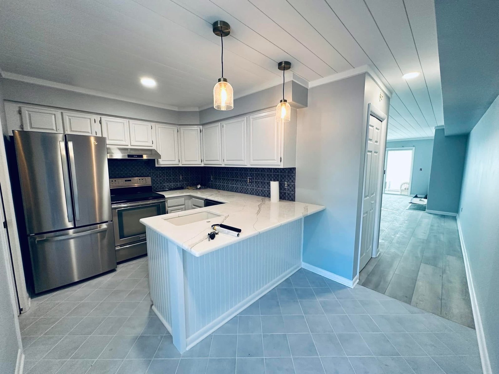 Mallard Lakes, Fenwick Island painted kitchen cabinets and island