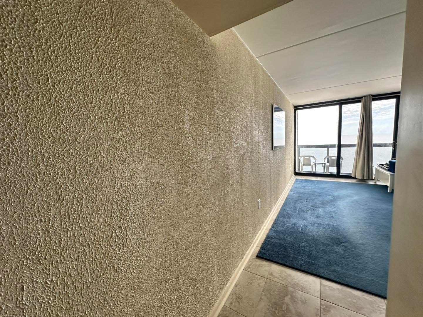 Oceanfront condo wall renovation photo 4