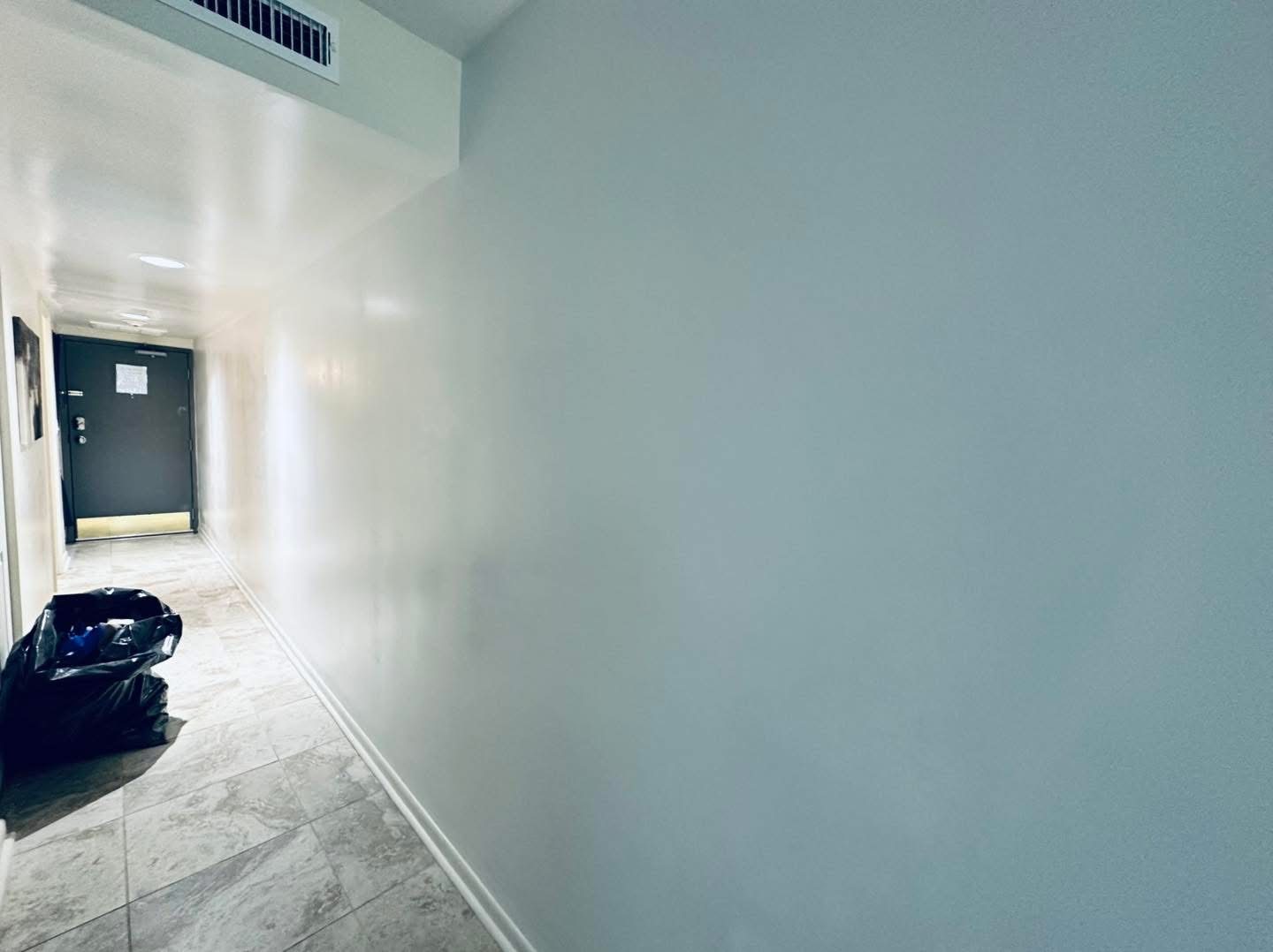 Oceanfront condo wall renovation photo 8