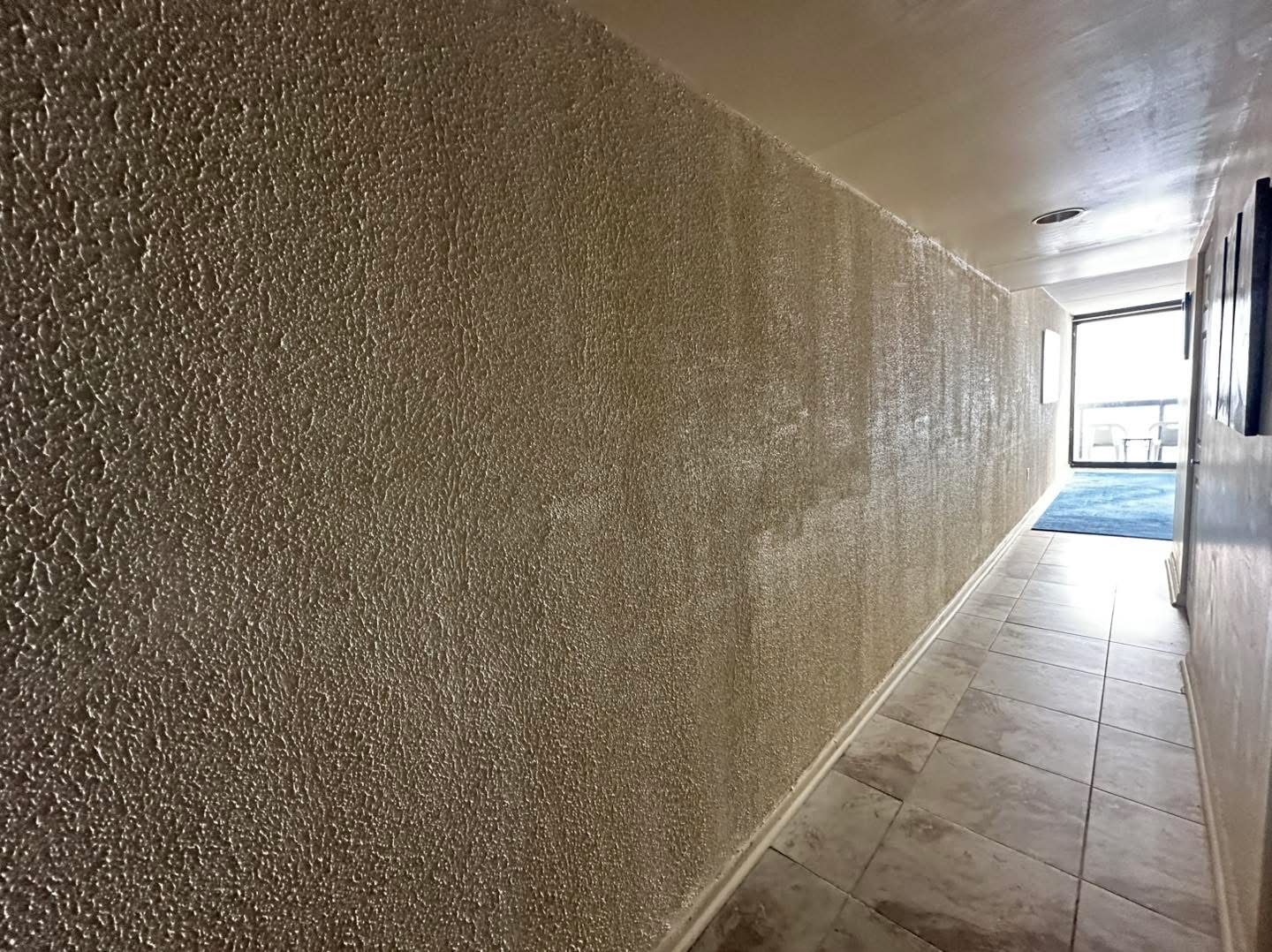 Oceanfront condo wall renovation photo 10