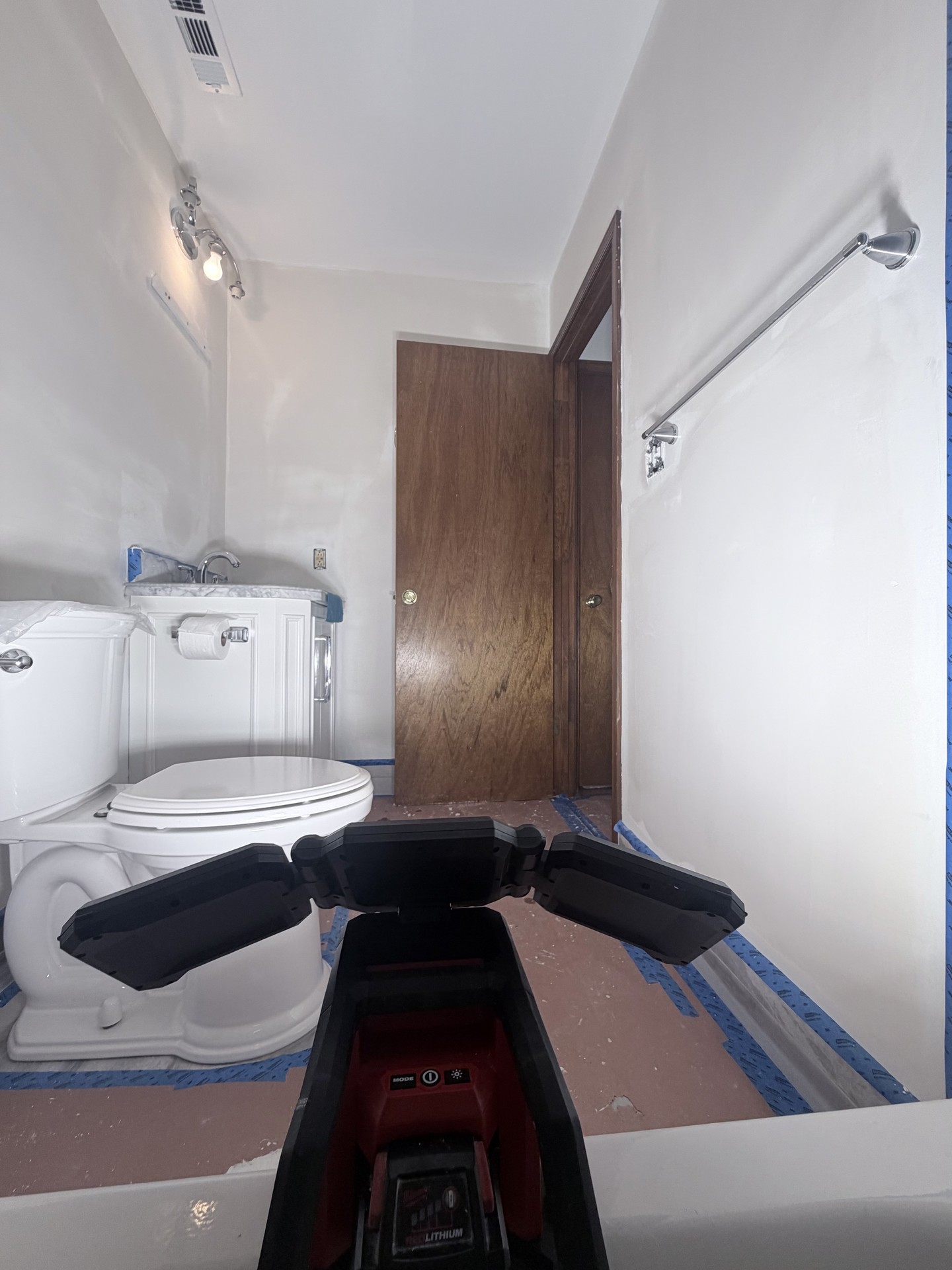 Ocean View bathroom during wall repair and paint preparation