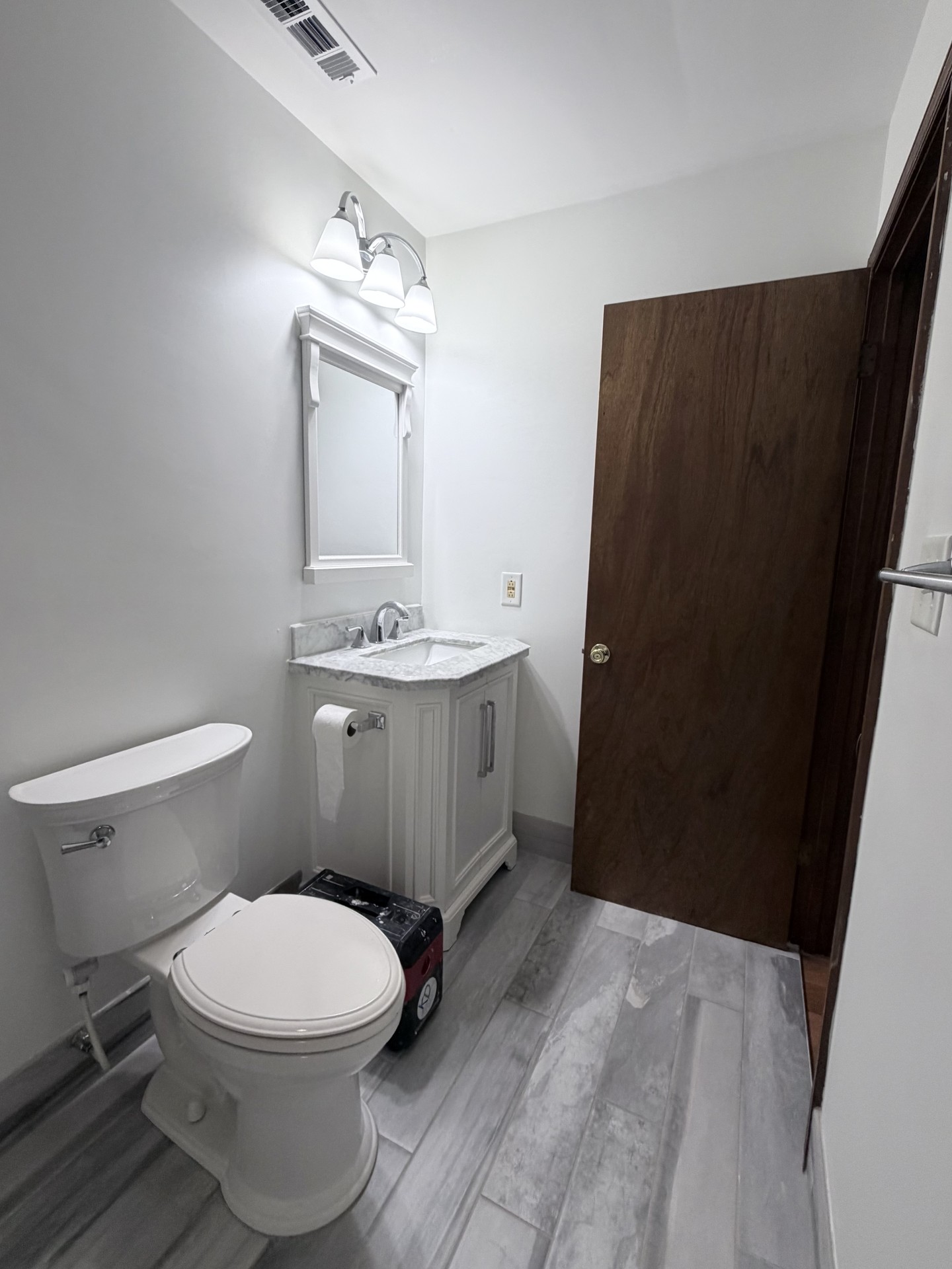 Finished Ocean View bathroom vanity wall after drywall preparation and painting
