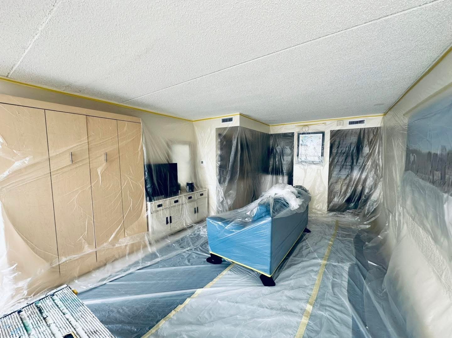 Oceanfront condo containment before ceiling texture removal