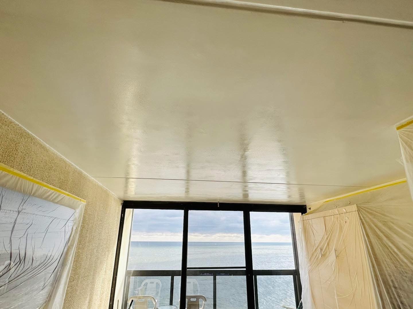 Oceanfront condo smooth ceiling finish in progress