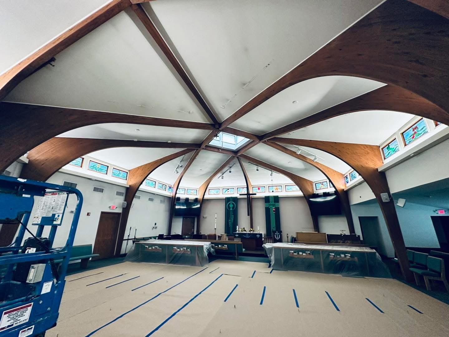 Lutheran Church of Our Savior interior during electrical-wiring drywall repairs