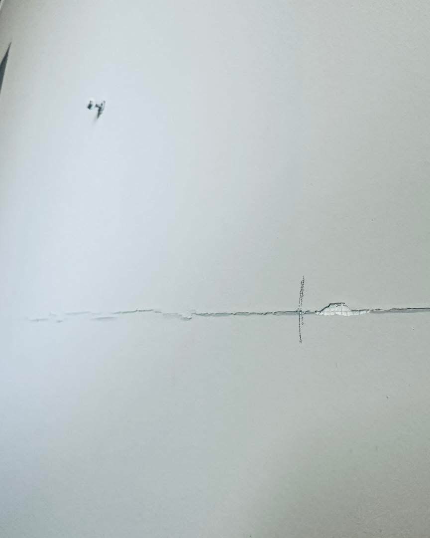 Rehoboth Beach cracked wall repair before correction
