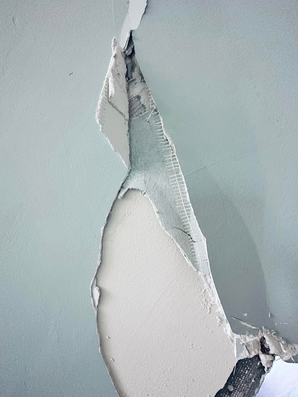 Rehoboth Beach damaged drywall corner before corrective work