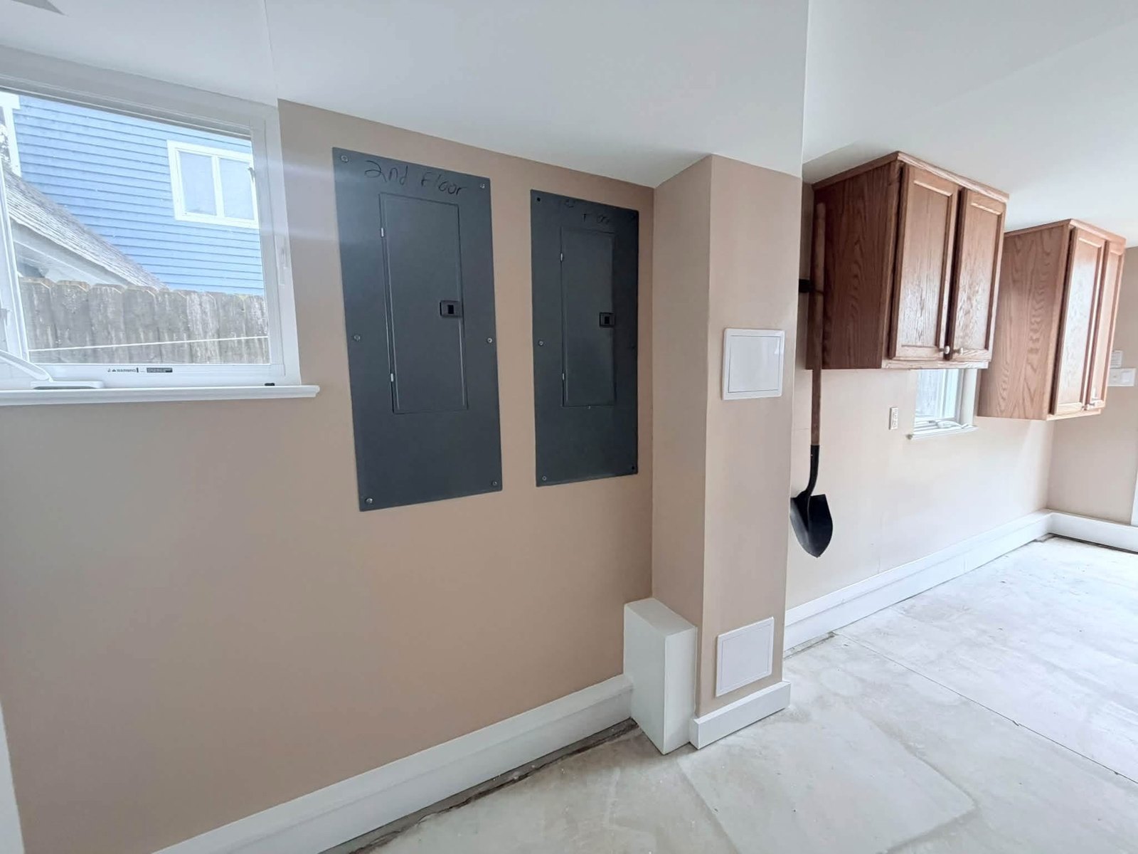 Finished wider Rehoboth Beach wall view with access panels and matched paint
