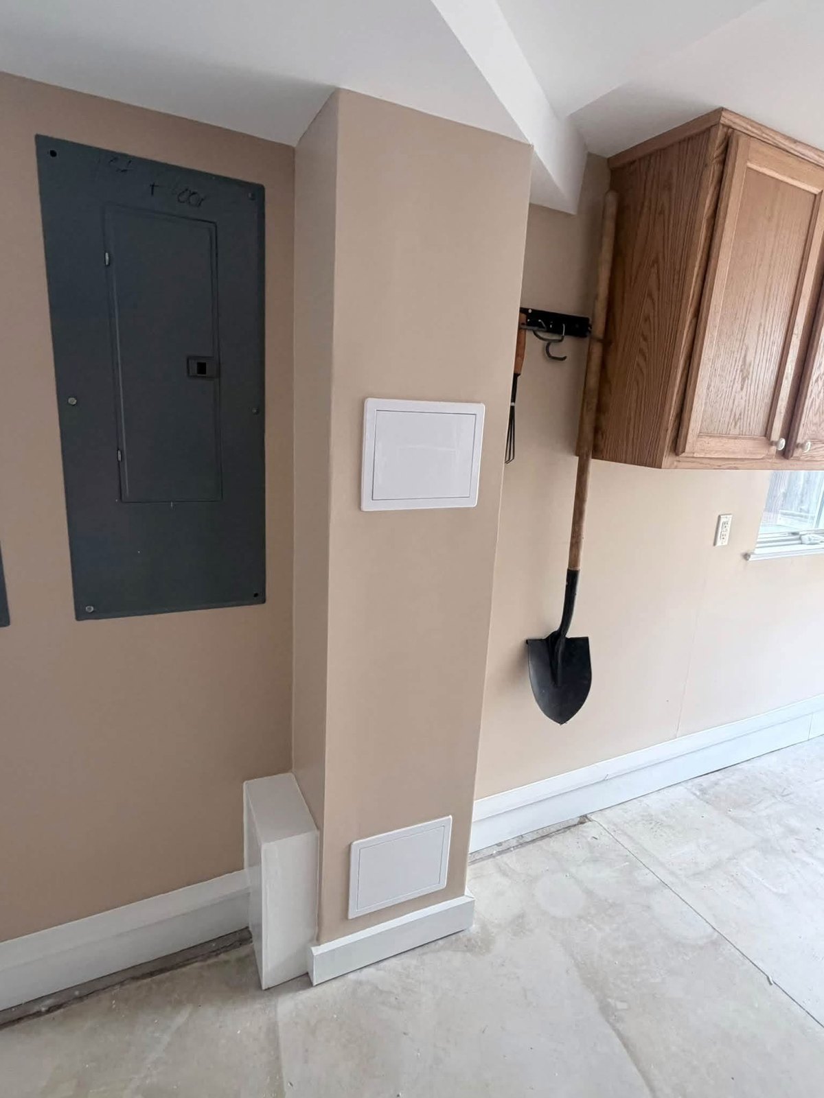 Finished Rehoboth Beach access-panel and surrounding-wall detail